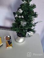 картинка 1 прикреплена к отзыву 20-дюймовая Елка с предварительно установленными светильниками тёплого белого и мультицветного света и украшениями - идеальное рождественское украшение для стола и рабочего стола. от Yoganand Stradley