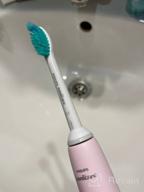 img 1 attached to Philips Sonicare 2100 Series HX3651 Sound Toothbrush, pink review by Hiral Yadav ᠌