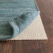 rugpadusa - super-lock natural - 2'x3' - 1/8" thick - natural rubber - gripping open weave rug pad - more durable than pvc alternatives, safe for all floor types logo