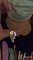 картинка 1 прикреплена к отзыву Valyria Stainless Steel Personalized Key Heart Puzzle Necklace Set With Birthstones - Custom Made With Any Name от Tony Elliott