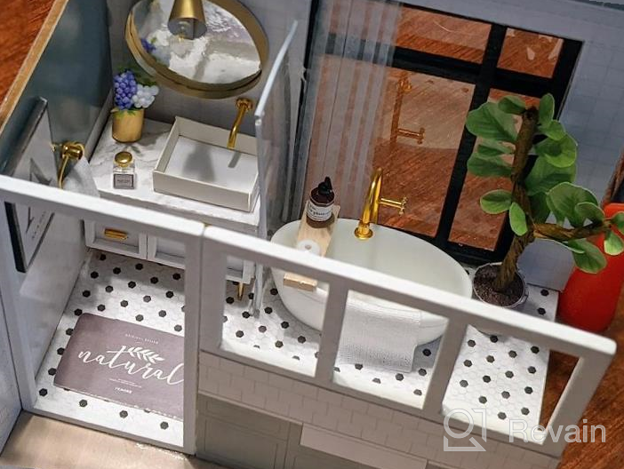 img 1 attached to DIY Miniature Dollhouse Kit 1:24 Scale Beachside Bungalow With Furniture And Dust Proof | Great Handmade Crafts Gift For Birthday Thanksgiving Christmas review by Kristie Jones
