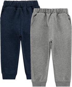 img 4 attached to 🩲 Stay Dry and Stylish with UNACOO Moisture Wicking Cropped Pants for Boys with Convenient Pockets