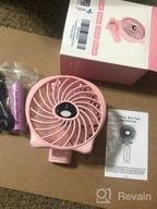 img 1 attached to Stay Cool On-The-Go: TriPole Mini Handheld Fan With USB Rechargeable Battery, Adjustable Speeds, And Foldable Design review by Mike Zeigler