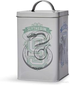 img 1 attached to Harry Potter Hogwarts House Crests Tin Storage Canister With Lid - Spacious 6-Inch x 4-Inch White 🏰 Metal Container - Vibrant Gryffindor, Hufflepuff, Slytherin & Ravenclaw Emblem On Each Side - Ideal for Organizing and Storing