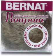 bernat grey lynx faux fur pom pom, 3-inch: the perfect accessory for trendy winter hats logo