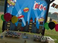 img 1 attached to Complete Superhero Party Decorations Kit - 6.4 X 4.9Ft Backdrop, 16Pcs Slap Bracelets, 60Pcs Balloons + More! review by Jessica Ortega