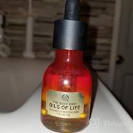 img 1 attached to Intensely Revitalizing Facial Oil - Vegan Oils Of Life By The Body Shop, 1.69 Fl Oz review by Maurice Jimenez
