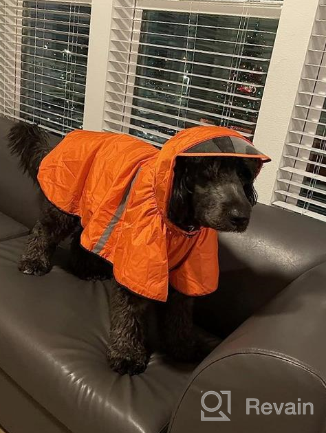 img 1 attached to Waterproof Dog Raincoat With Adjustable Belly Strap, Leash Hole & Reflective Strip - Lightweight Breathable Hoodie Jacket For Medium Large Dogs - Easy To Wear review by Mike Fedd