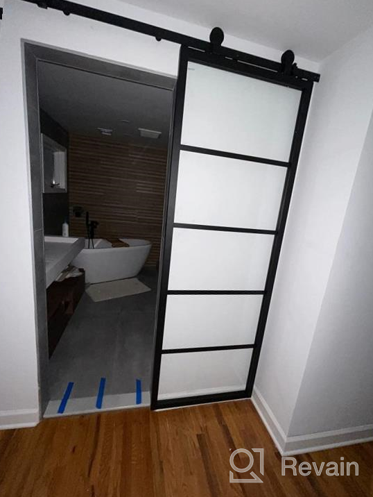 img 1 attached to 🚪 DIYHD TSD01 30x80" Sliding Barn Door with Black Frame and Clear Tempered Glass Panel - Prehung Assembled Glass Door Slab review by Nick Ward