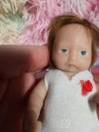 img 1 attached to Cute And Realistic Mini Silicone Baby Doll - Ideal For New Year Gift! review by Udders Sharma