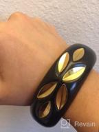 img 1 attached to 🖤 Richera Black Resin Bangle with Brass Metal Leaves Inlay review by Geoffrey Graham