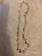 картинка 1 прикреплена к отзыву 💎 LOYATA Женское золотое покрытие 14К тонкий ошейник с бохемскими монетками-пайетками и подвеской с злым глазом Hamsa - Нежное колье на тонкой цепочке для привлекательного стиля. от Rick Rownd