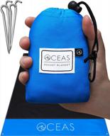 stay dry and comfortable anywhere with the oceas outdoor pocket blanket logo
