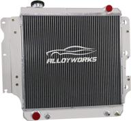 alloyworks 3 row all aluminum radiator - perfect fit for 1987-2006 jeep wrangler tj yj - enhanced cooling for 2.4l, 2.5l, 4.0l, 4.2l engines - 2001-2005 compatible models logo