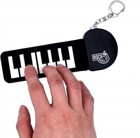 img 4 attached to Rock And Roll It Micro Piano Keychain - Real Working & Playable Portable Finger Piano Pad. Mini Size Black/White Silicone Electronic Keyboard With Battery Included