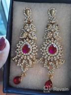 img 1 attached to Exquisite 'Touchstone Hollywood Glamour Oscar Collection' Indian Paisley Motif Designer Bridal Jewelry: Long Chandelier Earrings in Antique Gold and White Tone for Women review by Grant Nordstrom