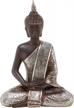 6" black polystone buddha sculpture with engraved carvings and relief detailing - deco 79 logo