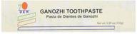 dxn ganozhi toothpaste with ganoderma logo