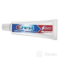 🦷 regular size crest toothpaste for oral care on-the-go logo