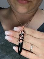 img 1 attached to Bivei Vintage Reiki Healing Crystal Necklace - Exquisite Hexagonal Prism Quartz Point Pendant With Flower Wrapped Pendulum - Stunning Jewelry Piece For Spiritual Healing review by Jennifer Mitchell