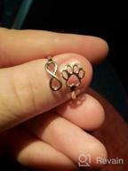 img 1 attached to Express Your Love For Your Pet With Our PawPrint Heart Infinity Ring - 925 Sterling Silver Adjustable Ring For Women & Teen Girls review by Jonathan Roloff