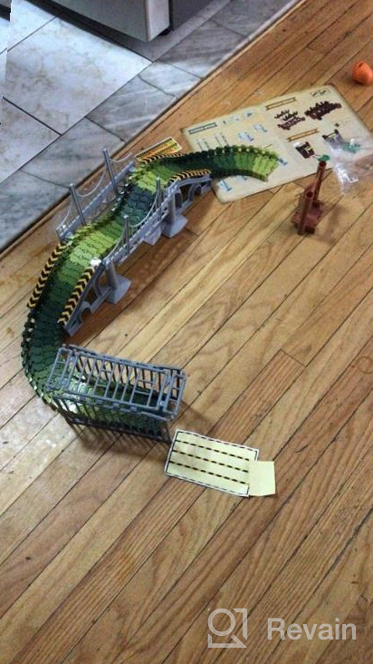 img 1 attached to 159 Pcs Dinosaur Glow In The Dark Race Train Track Toy For Boys & Girls Ages 3-7 | DinoManiacs By JitteryGit review by Ben Jacobson