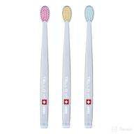 🦷 gentle cleaning ergonomic oral care toothbrush from switzerland logo