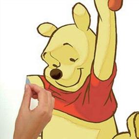 img 2 attached to Sweeten Your Walls With RoomMates Winnie The Pooh Swinging For Honey Wall Decals!