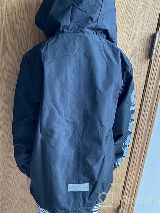 img 1 attached to Waterproof Hooded Rain Jacket for Kids - Lightweight Fleece Lined Coat for Boys and Girls - Windbreaker Raincoat review by Kyle Terry