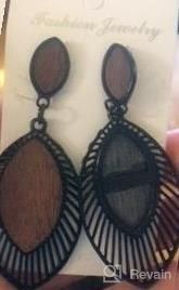 img 1 attached to Get The Ethnic Look With Udalyn'S 9-Pair Wooden Dangle Earrings For Women review by Marcus Loeffler