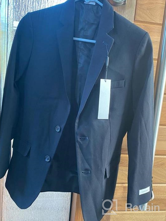 img 1 attached to 🕴️ Stylish & Versatile Calvin Klein Boys' Bi-Stretch Blazer Suit Jacket with 2-Button Single Breasted Closure review by Kyle Ahmed