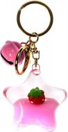 unicorn glitter keychain with tropical fruit and dried flower accents, heart and diamond shapes, and liquid center logo