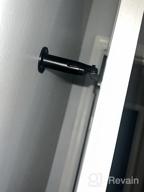 img 1 attached to HOMOTEK Heavy Duty Latch Hook Door Stop With Sound Dampening Rubber Bumper - Wall Mounted, Black (1 Pack) review by Danielle Davis