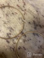 img 1 attached to Dainty 70mm 14K Yellow Gold Silver Big Large Hoop Earrings: Stylish, Hypoallergenic, Perfect Gift for Women and Girls with Sensitive Ears review by Lisa West