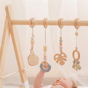 img 2 attached to 🌳 Wood Baby Gym with Foldable Frame and 4 Pendant Toys: Perfect Newborn Gift for Baby Girls and Boys