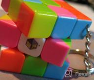 img 1 attached to Compact And Colorful 3X3 Rubik'S Cube Keychain For Speedcubing And Magic Shows - Stickerless And Fast Miniature Cube By CuberSpeed review by Danny Nedumaran