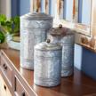 set of 3 gray metal decorative jars with lids by deco 79 - heights of 12", 9", and 8 logo