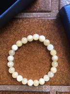 img 1 attached to Spiritual Style: CANDYFANCY'S 8Mm Natural Beaded Stretch Bracelets For Women And Men review by Regina Smith