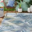bring the coastline indoors with tommy bahama malibu palm springs rug in ivory/aqua blue logo