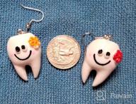 img 1 attached to Seakuur 2 Pairs Cute Tooth Dangle Earrings: Fun Dentist Jewelry for Women & Girls, Ideal Graduation Gift review by Jimmy Montalvo