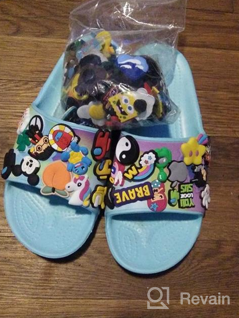 img 1 attached to 👦 Crocs Kids' Classic Slide Sandals - Unisex Child review by Cori Nance