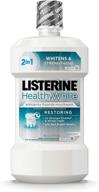 🦷 revitalize your oral health with listerine's healthy restoring fluoride mouthwash logo