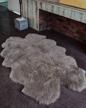 luxury new zealand sheepskin rug: soft fur for bedroom, living room & motorcycle seat cover logo