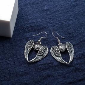 img 2 attached to Szxc Women'S Crystal Guardian Angel Wings Hypoallergenic Dangle Earrings Biker Jewelry 2.25 Inches