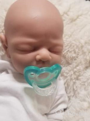 img 1 attached to Silicone Baby Doll - 14 Inch Eyes Closed Boy With Pacifier Capability | Made With Full Silicone Material | Not Vinyl Dolls By Vollence review by Nick Grays