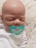 картинка 1 прикреплена к отзыву Silicone Baby Doll - 14 Inch Eyes Closed Boy With Pacifier Capability | Made With Full Silicone Material | Not Vinyl Dolls By Vollence от Nick Grays
