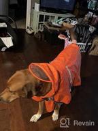img 1 attached to Waterproof Dog Raincoat With Adjustable Belly Strap, Leash Hole & Reflective Strip - Lightweight Breathable Hoodie Jacket For Medium Large Dogs - Easy To Wear review by Justin Luna