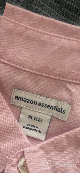 img 1 attached to Amazon Essentials Short Sleeve Uniform Oxford Boy's Clothing: Quality & Style Combined review by Black Holstead