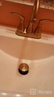 картинка 1 прикреплена к отзыву 🚰 TRUSTMI Brushed Gold Bathroom Faucet: 2 Handle Lavatory Sink Faucet with Pop Up Drain and Water Supply Lines от Nicholas Serafini