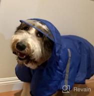 img 1 attached to Waterproof Dog Raincoat With Adjustable Belly Strap, Leash Hole & Reflective Strip - Lightweight Breathable Hoodie Jacket For Medium Large Dogs - Easy To Wear review by Bruce Garner